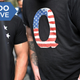 A man wearing a QAnon t-shirt attends a rally in front of City hall during the “Anti-Mandate March For Choice”, New York, NY, October 25, 2021.